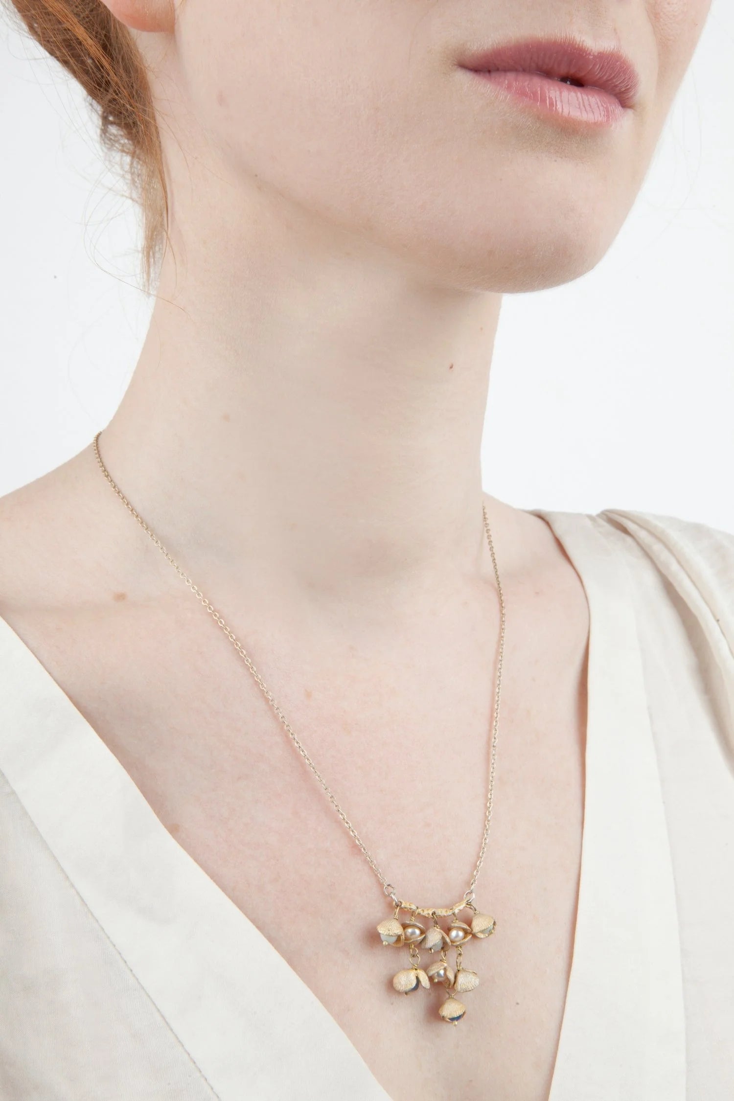 Collana con ciondolo in conchiglia