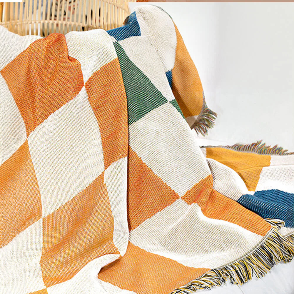 Coperta multifunzionale per divano con protezione antigraffio e design a scacchiera color block
