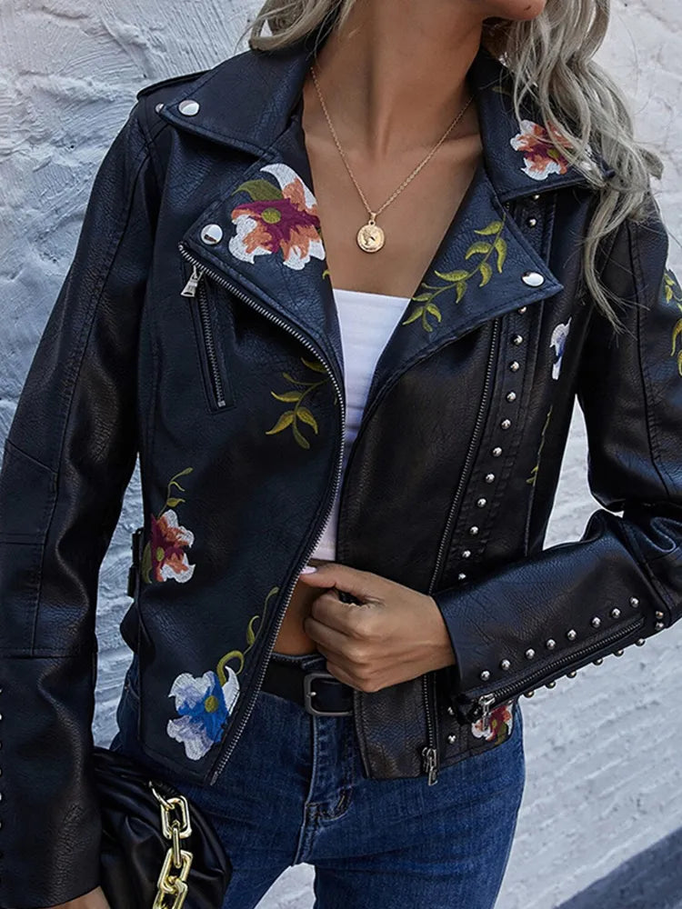Floral leather jacket with artisanal detailing