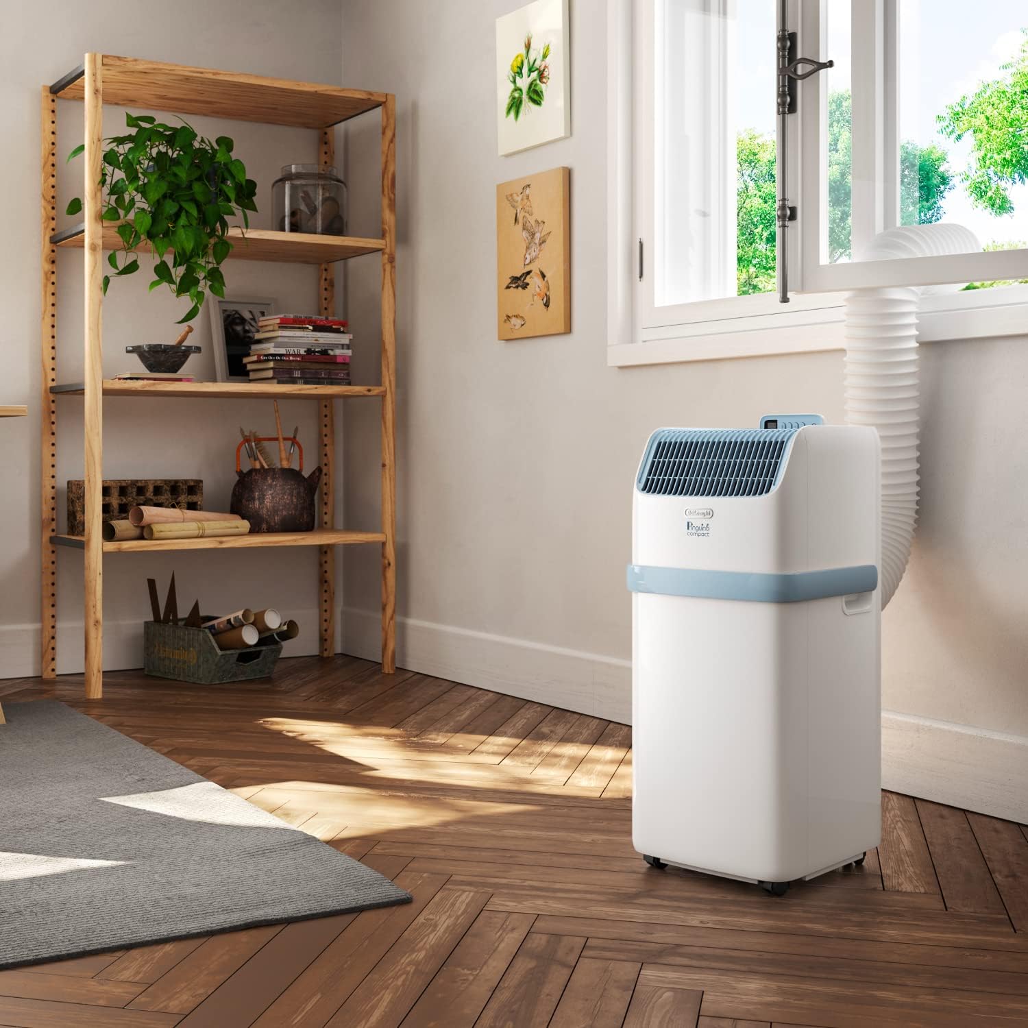 De'Longhi Pinguino PAC EM82, Condizionatore Portatile per ambienti fino a 80 m³, 9.400 BTU, 2,4 kW, 63 dB, Funzione Deumidificatore, Classe Energetica A, Timer 24h, Bianco