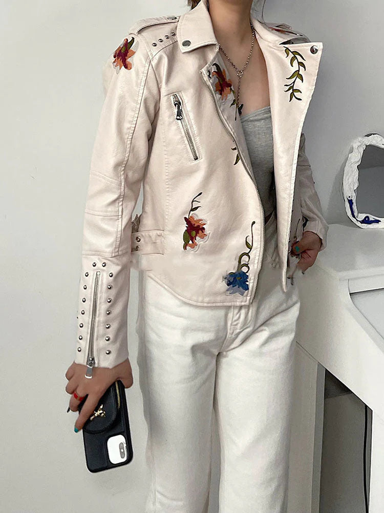 Floral leather jacket with artisanal detailing
