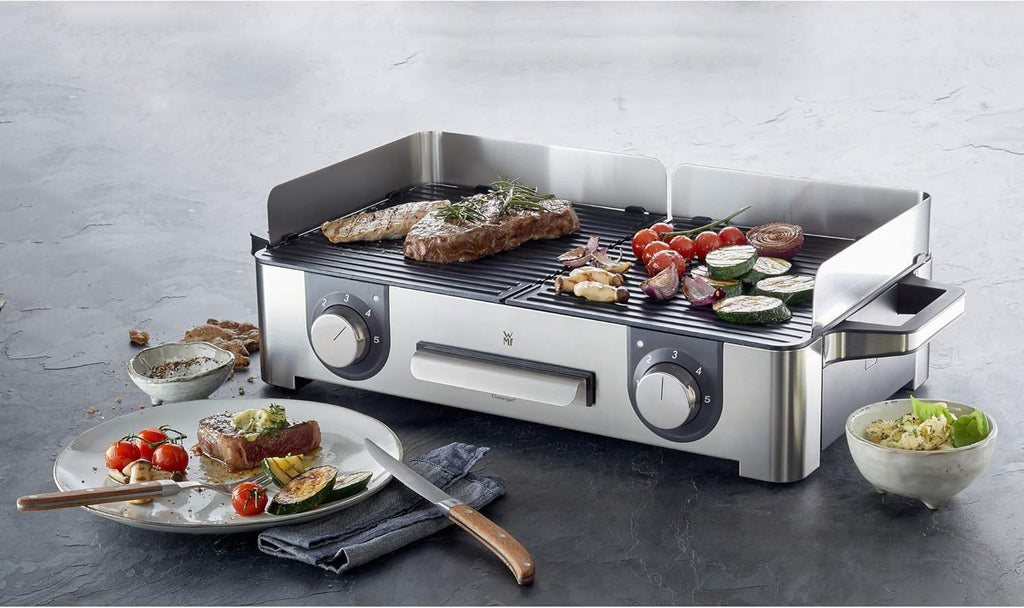 WMF Lono Master-Grill, Grill Elettrico, 50x28 cm, Grill Elettrico da Tavolo con Paravento e Vaschetta Raccogligocce, Certificato per Esterni per Barbecue, 2 Superfici di Cottura Regolabili Separatamente, 2400 W, Acciaio Inossidabile Opaco