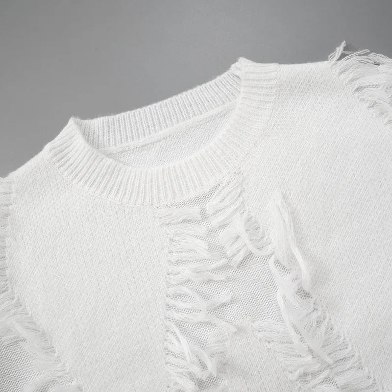 Pullover oversize da donna con nappe