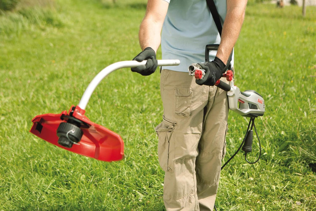AL-KO Tagliabordi elettrico BC 1200 E (potenza motore 1200 Watt, larghezza di taglio 35 cm (filo), larghezza di taglio 23 cm (lama), filo regolabile tramite sistema Tap&Go, asta in alluminio divisibile, incl. tracolla)