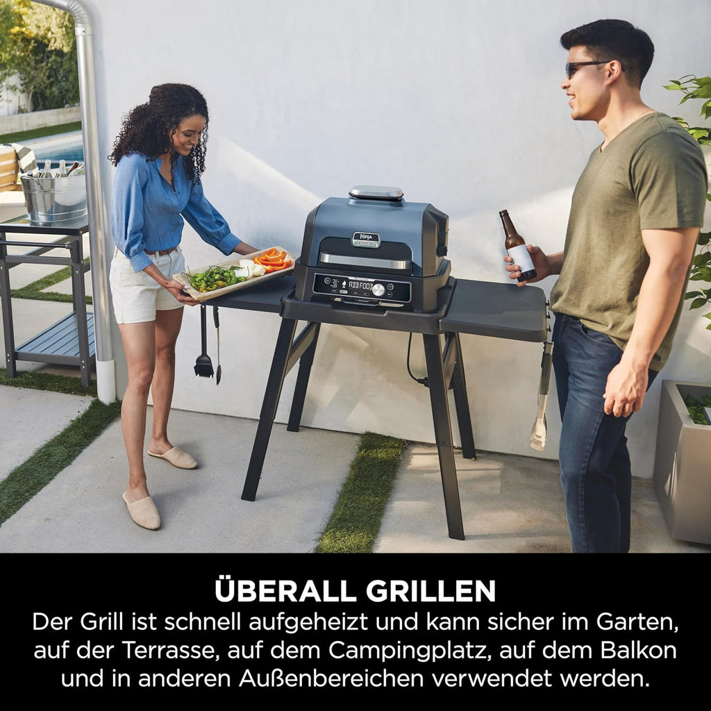 Ninja Woodfire Barbecue Elettrico & Affumicatore & Friggitrice ad Aria, Barbecue da Esterno 7-in-1, Frigge ad Aria, Affumica, Arrostisce, Cuoce al Forno e Altro, Resistente alle Intemperie, Antiaderente, Portatile, Elettrico, Grigio/Nero OG701EU