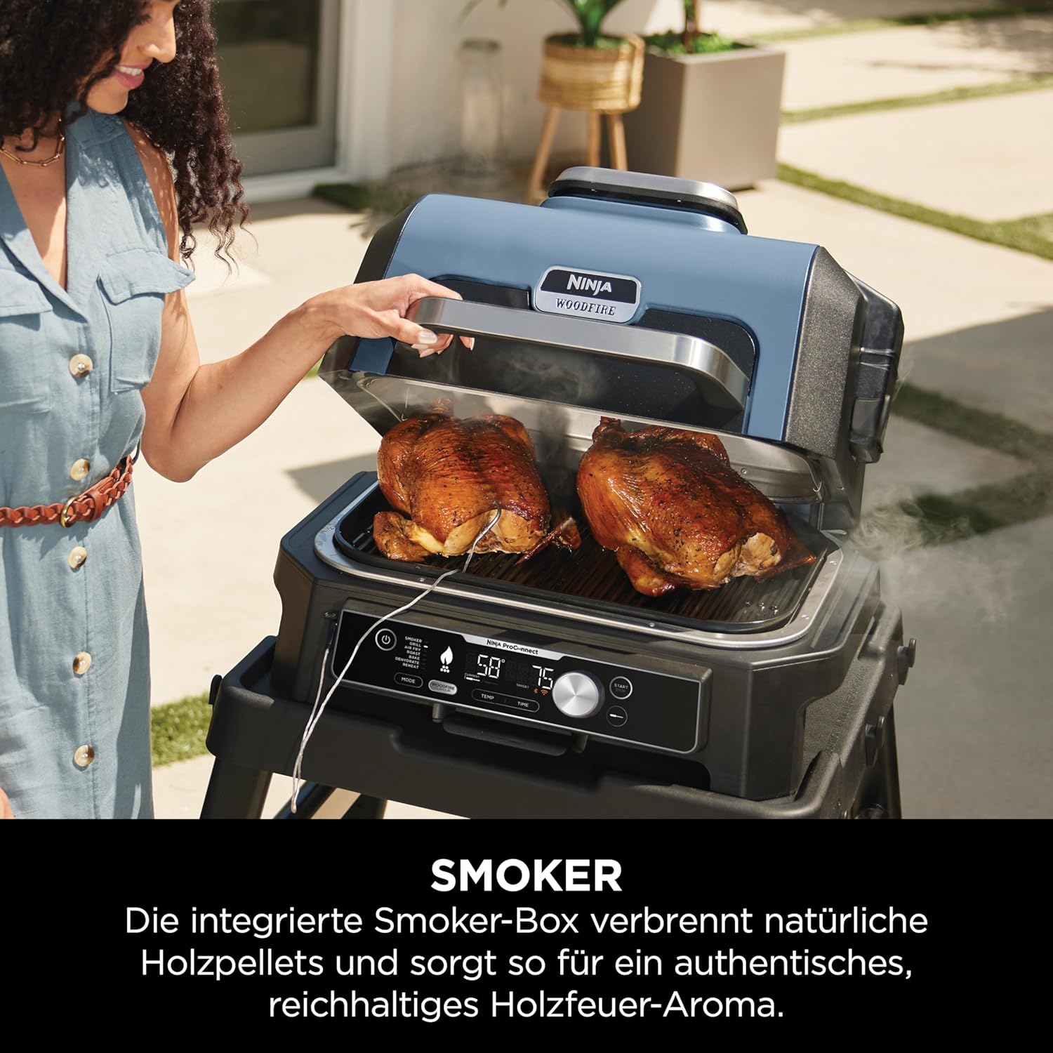 Ninja Woodfire BBQ elettrico e affumicatore e friggitrice ad aria, grill da esterno 7 in 1, friggitrice ad aria, affumicatore, arrostitore, forno e altro ancora, resistente alle intemperie, antiaderente, portatile, elettrico, grigio/nero OG701EU