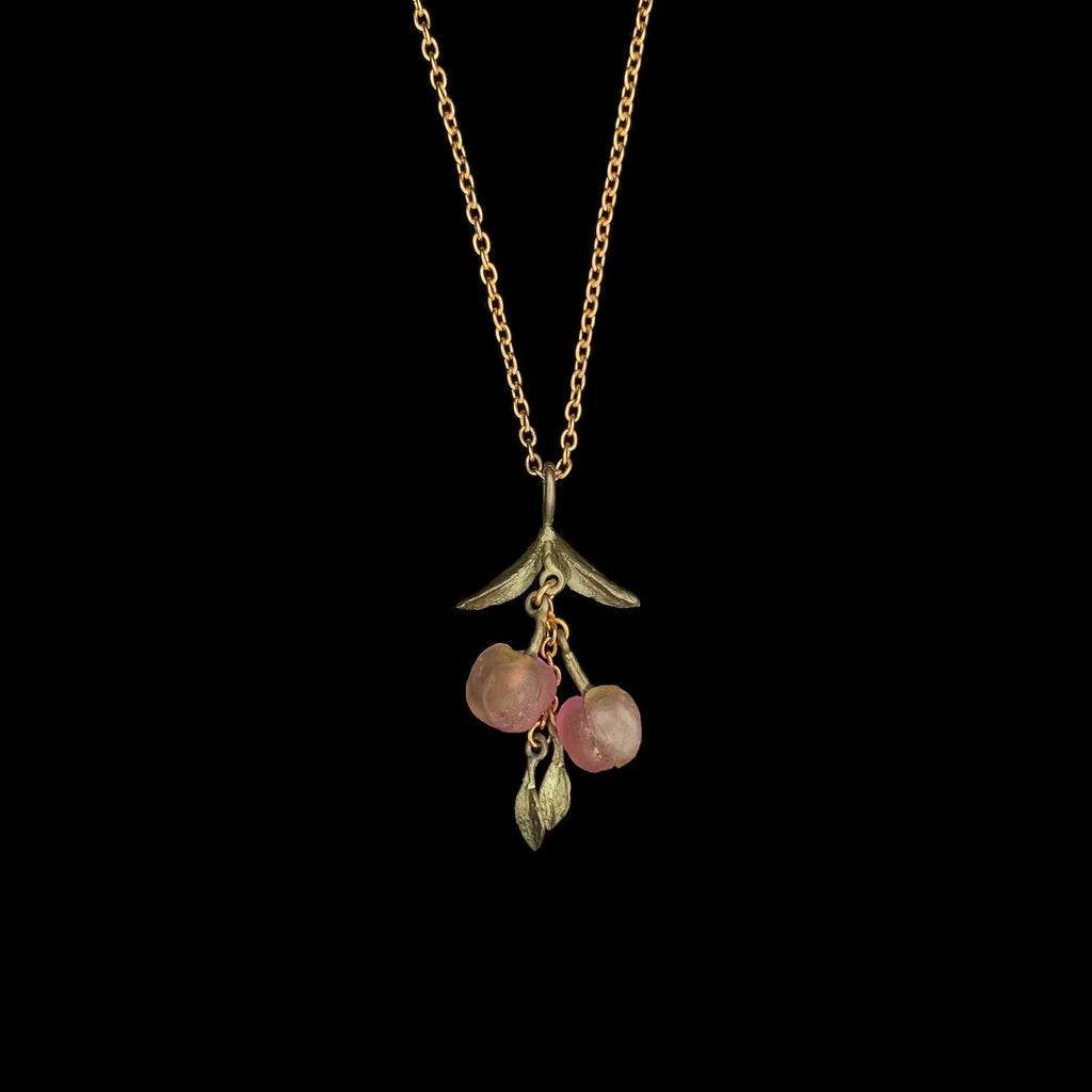 Collana color pesca con ciondolo