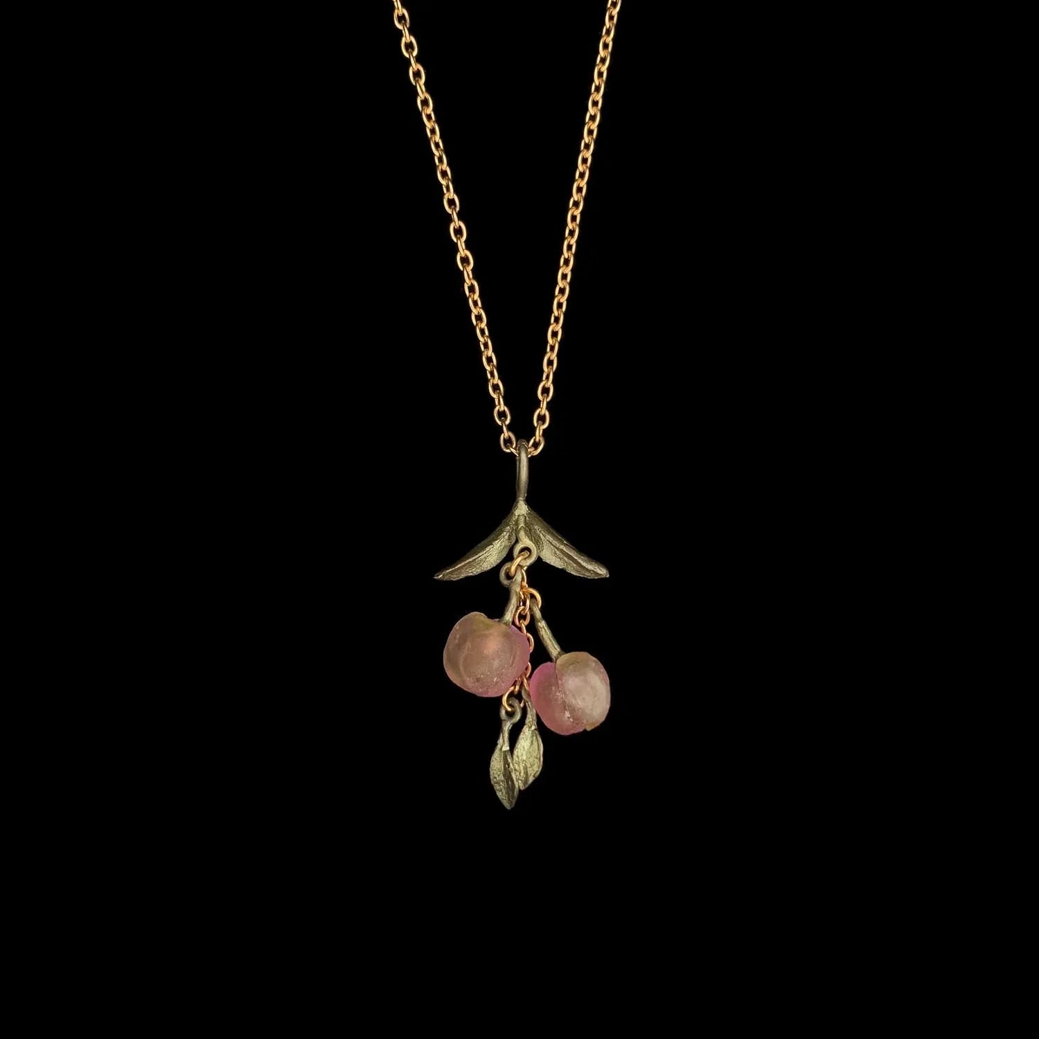 Collana color pesca con ciondolo