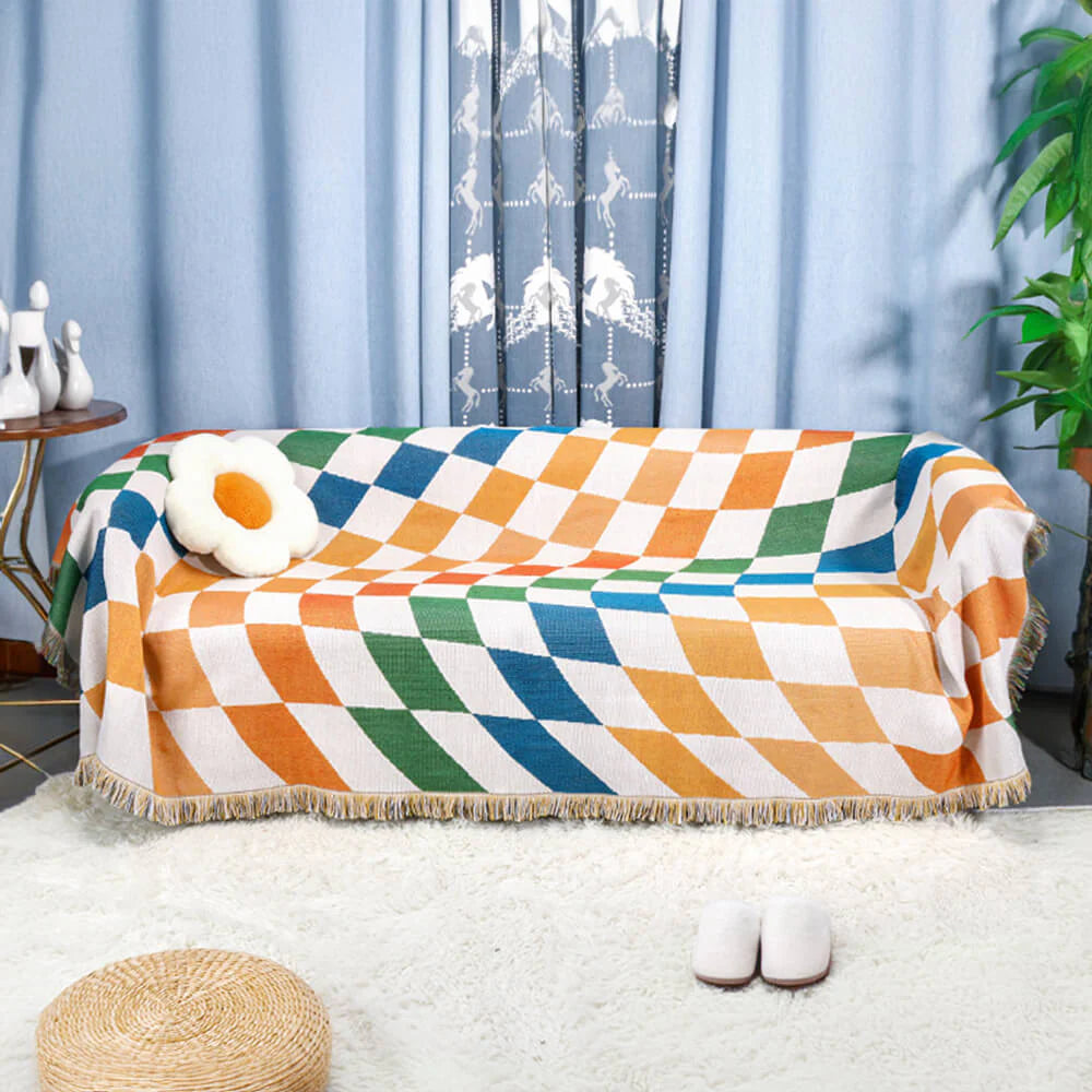 Coperta multifunzionale per divano con protezione antigraffio e design a scacchiera color block