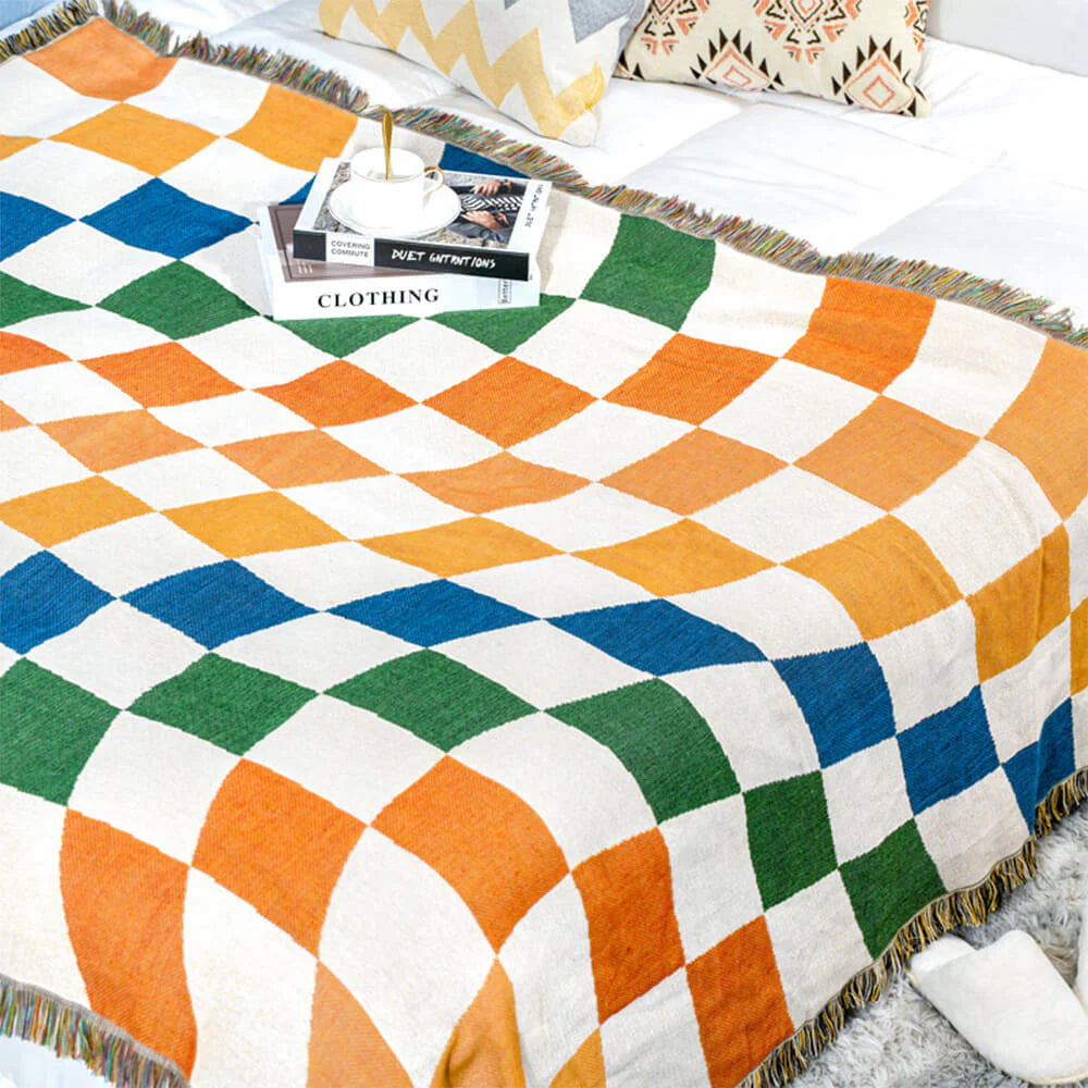 Coperta multifunzionale per divano con protezione antigraffio e design a scacchiera color block