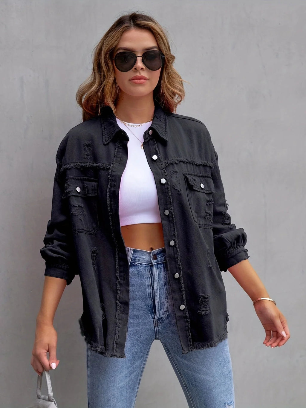 Zerrissene Denim-Jacke in bergre