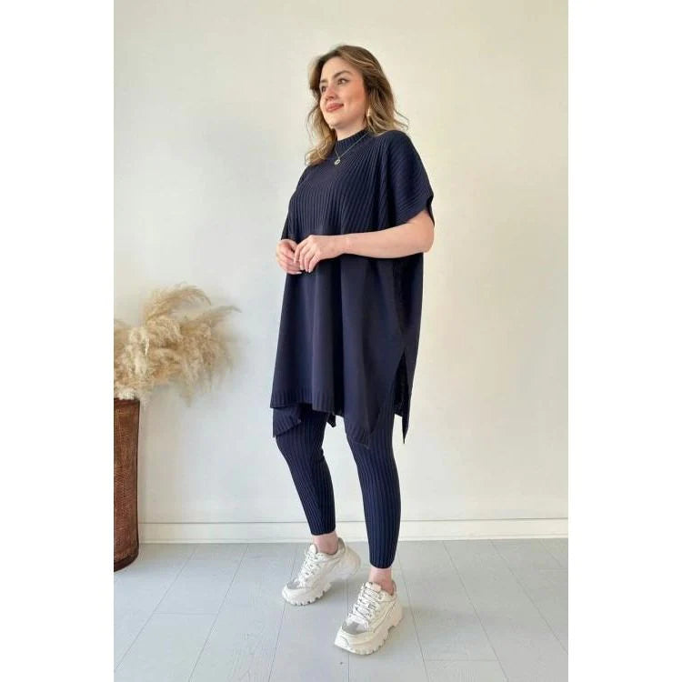 Completo pantaloni e maglione alla moda