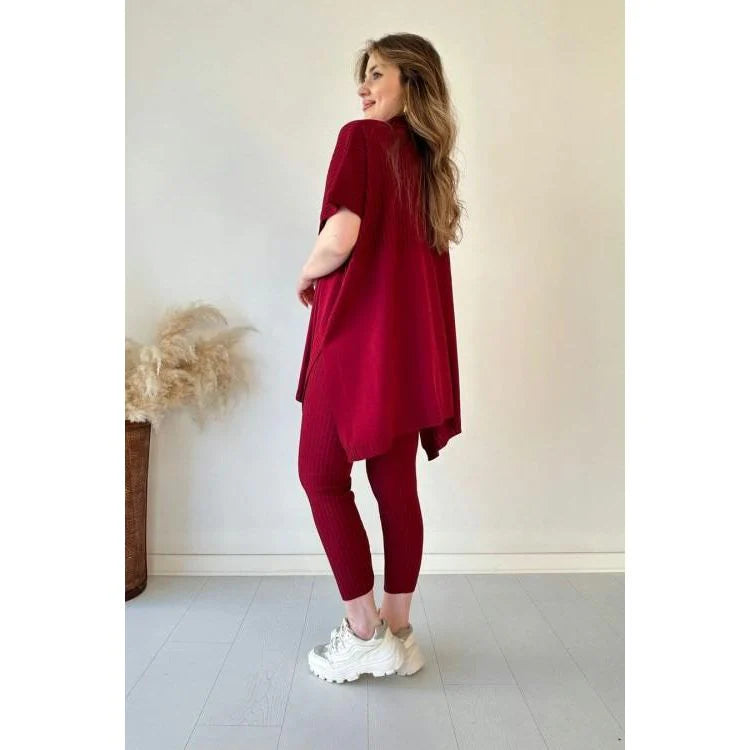 Completo pantaloni e maglione alla moda