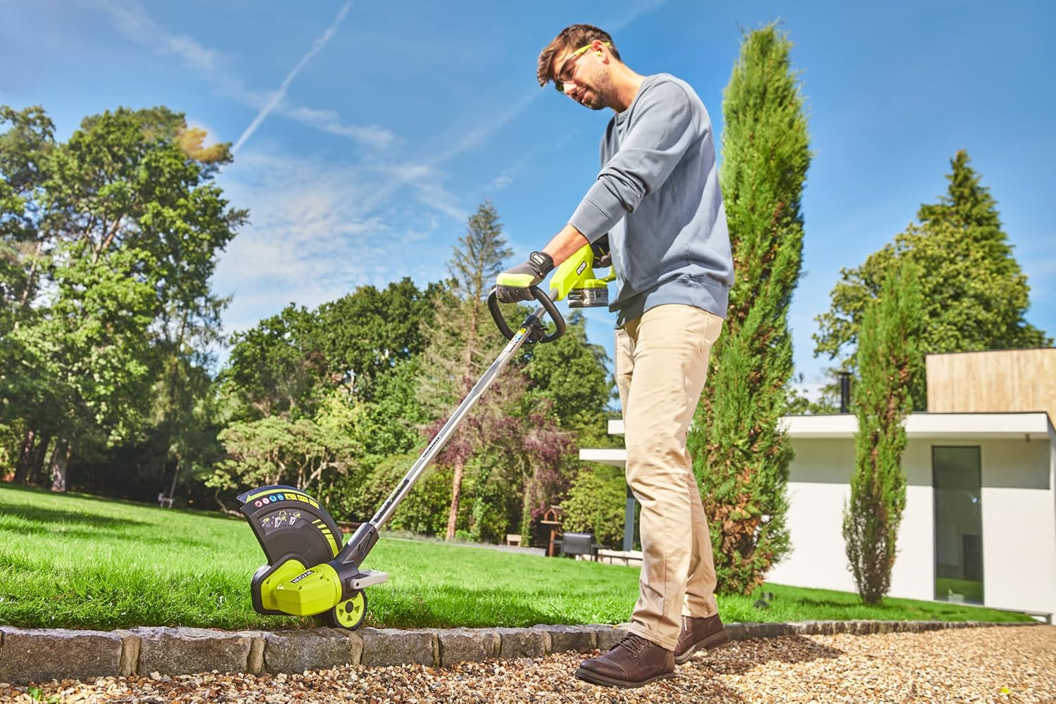 RYOBI 18 V ONE+ Akku-Rasentrimmer mit Radführung RY18LT33A-0 (33 cm Kantenschneidefunktion mit Fußsteuerung, Ø Fadenspule 1 x 1,65 mm, ohne Akku und Ladegerät)