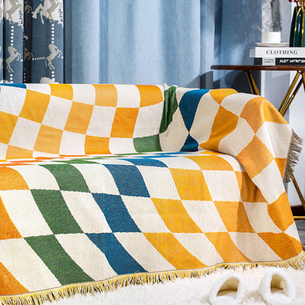 Coperta multifunzionale per divano con protezione antigraffio e design a scacchiera color block