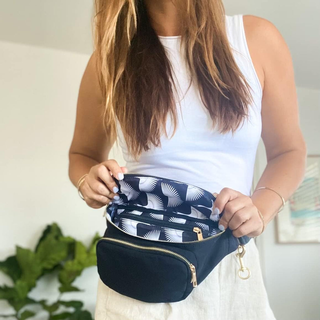 Borsa fasciatoio piccola Ditty Co. – Tappetino per il cambio portatile – Borsa a tracolla per donne – Porta salviette umidificate – Essenziali da viaggio per neonati (nero assoluto)